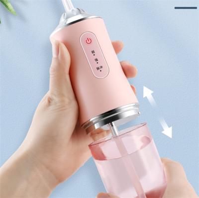 China The Small Outdoor Portable Travel Dental Teeth Remover Water Flosser Waterpik for sale