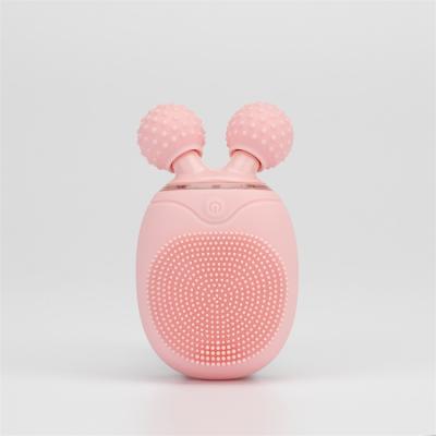 China Sonic Cleaner Vibrating Mini Electric Rechargeable Silicone Face Acne Treatment Detergent Facial Cleansing Brush With Roller Massager for sale