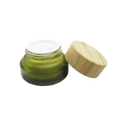 China Frascos cosméticos de vidro azuis para o ombro inclinado do creme hidratante com tampa de bambu 5g à venda