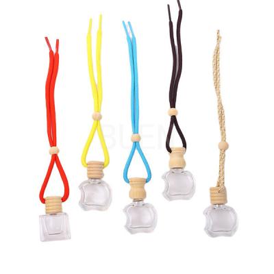 Chine Voiture accrochant la bouteille en bois de diffuseur d'arome en verre de chapeau autour de la bouteille de parfum de diffuseur de voiture à vendre