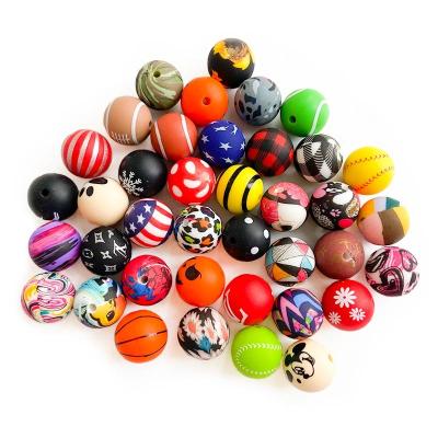 China Soft Toy Printing Designs Food Grade Leopard Print Silicone Beads 15mm Silicone Printed Beads Chewable Round Baby Teething Beads for sale