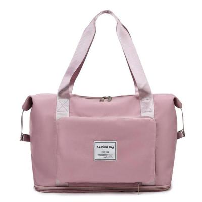 China Lady Folding Travel Bags Tote Handbag Large Capacity Waterproof Travel Duffel Bags Travel Shoulder Bags for sale