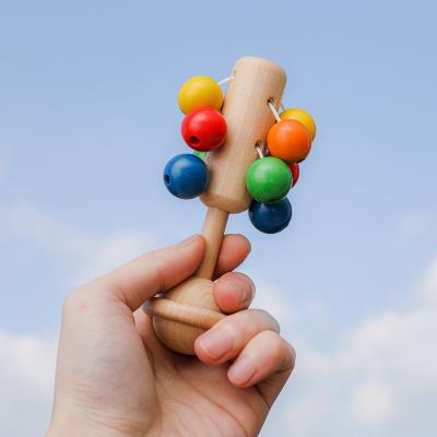 China Musical Color Rattle Baby Toy Newborn Toy Teether Rattle Wooden Hand Holding Teether Rattle Stick for sale