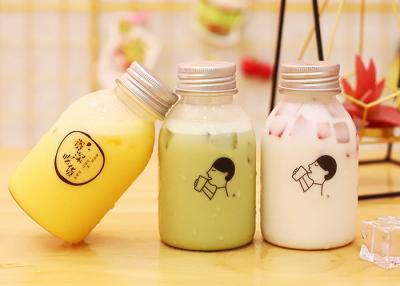 中国 11oz冷たいジュースの包装のためのプラスチック再生利用できるジュースのびん-押した 販売のため