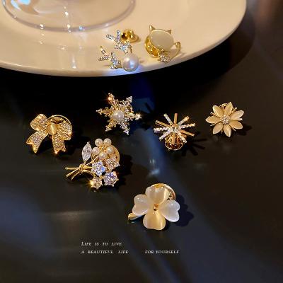 China Trendy gold plated zircon pearl kitten brooch, flower bouquet, snowflake dress and opal accessories for sale