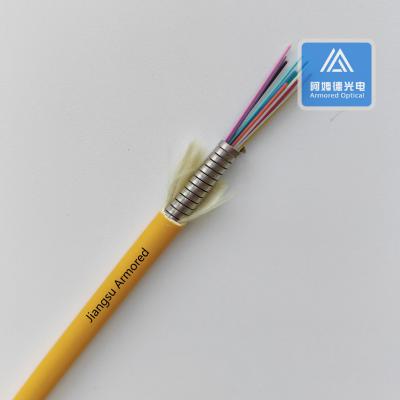 China 12 cores Multi Mode Spiral Armored Fiber Cable 6.0mm Oranje PVC Rodent Resistent FTTH Te koop
