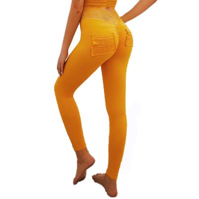 China The 2020 sexy women antibacterial solid booty pantyhose crack! crack! With Striped Belt Ruched Butt Pocket Workout Breathable Fitness Gaiters Pants for sale