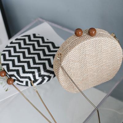 China Fashion Straw Woven Cross Chain European circular waterproof women's and American style women's bag for sale