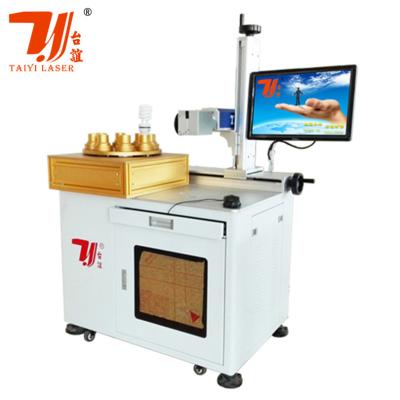 Cina una lampadina principale rotatoria automatica Logo Printing Laser Marking Machine di 8 stazioni di 20W 30W 50W 100W in vendita