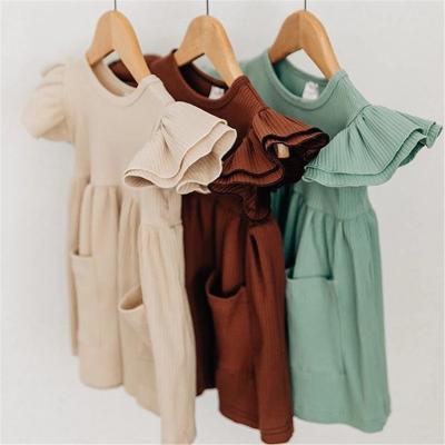China Summer Breathable Fashion Baby Girl Ruffle Sleeve Cotton Jerssy Casual Dress With Pocket for sale
