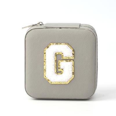 China Kleines Leder Grau Schmuck Organisator Reisetasche Schmuck Lagerbox zu verkaufen