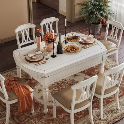 China Solid Wood Foldable Pure Dining Set American Round Retractable Dining Table Solid Wood Folding Dining Table and Chair Set for sale