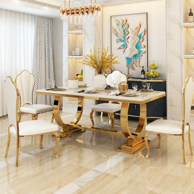 China Mesa de comedor de mármol de acero inoxidable para hogares modernos en venta