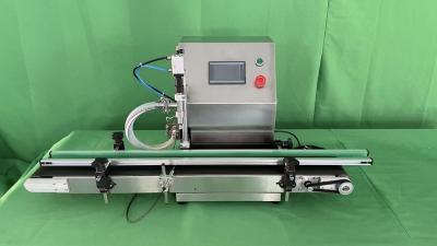 China Table type filling machine Desktop automatic filling machine with conveyor belt for sale