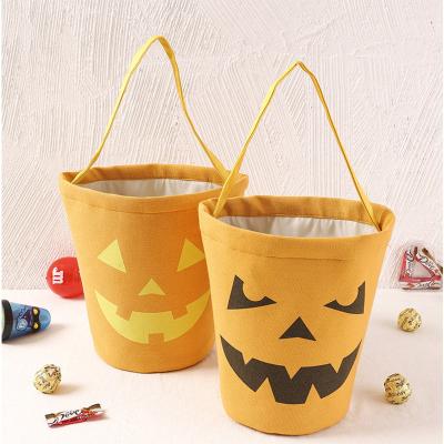 China Hot Selling Cotton Canvas Gift Bag Halloween Gift Bag Silk Screen Printing Logo Organic Handled Eco Friendly Custom Storage Candy Bag for sale