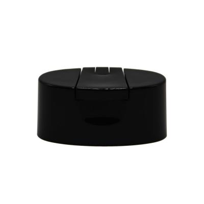 China Non Spill Oval Black Plastic Capsule Hair Lotion Cap For Shampoo Bottle Flip Top Cap for sale