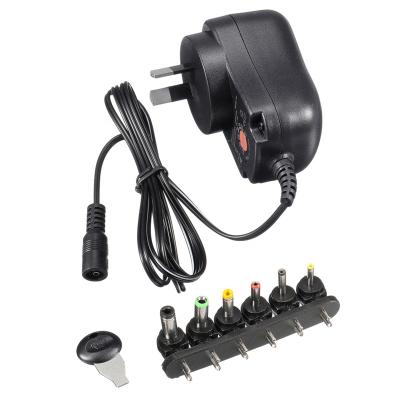 China Universal 3V-12V 12W/30W Adjustable Universal Power Supply Adapter Converter With Multiple DC - 12W Tips for sale