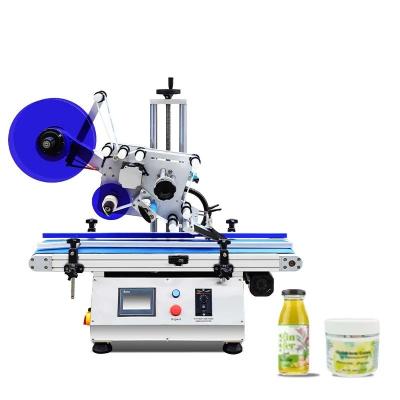 China Juice Bottles Round Top Digital Bottle Printing Labeling Machine Beverage Candle Table for Essential Oil Bottle for sale