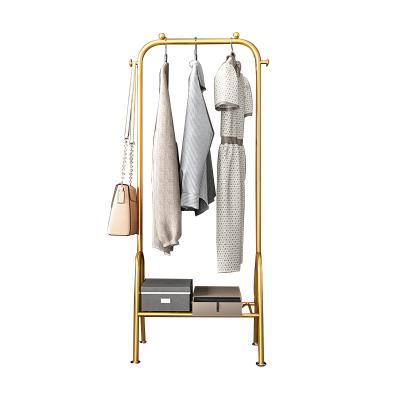China Hot Selling Light Luxury Clothes Rack Folding Floor Rack Bedroom Hanger Household Clothes Shelf Drying Rod Floor Coat Rack Nordic Rack for sale