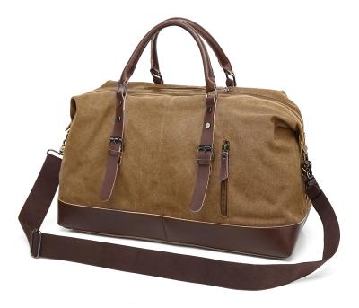 China Manufacturers Retro Canvas Travel Luggage Large Capacity Canvas Waterproof Bag Custom Shoulder Portable Messenger Travel Bag for sale