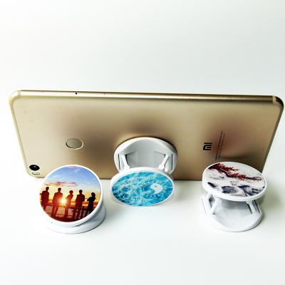 China Adjustable Promotional Custom Logo Popular Folding Finger Phone Mobile Phone Holder for sale