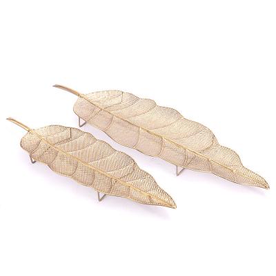 China Creative Artistic Design Luxury Metal Art Gold Excludes Tray Decor For Home Hollow for sale