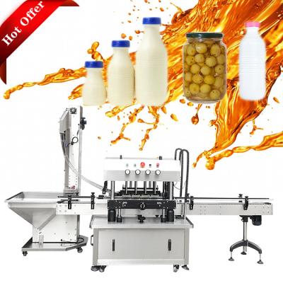 China Beverage Machine High Speed Rotary Capping Sealing Machine For Fruit Glass Bottle for sale