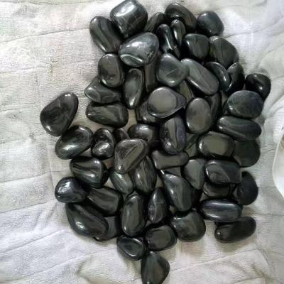 China Modern polished honed decorative cobblestones from black pebbles for sale