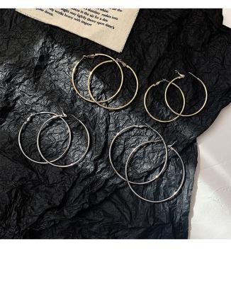 China Fashion Jewelry Cheap Wholesale Fashion Gold Stainless Steel Simple Exaggerated Circle Earrings Large For Women for sale