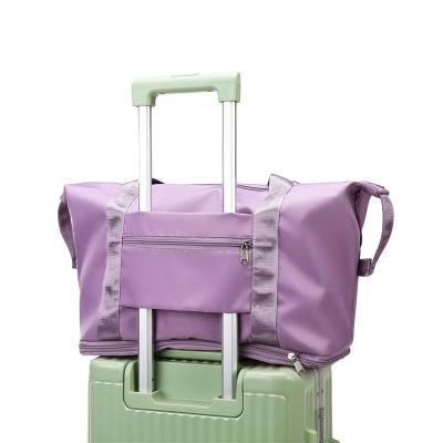 China High Quantity Fashion Men Women Vacation Gym Folding Lightweight Waterproof Luggage Travel Bags Collapsible Duffel Bag for sale