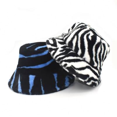 China New Soft Wholesale Price Adult Printed Winter Design Furry Luxury Bucket Hat for sale
