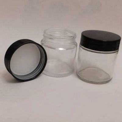 China Factory Price 2021 Food 3.5 Gram Glass Jars Open Child Proof Lids Hand Sealable With Custom Stickers for sale