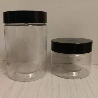 China 3.5g Empty Clear Heavy Duty Food Storage Container Flower Kid Glass Jar With Black Lid for sale