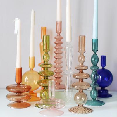 China Borosilicate home hand restaurant hotel cafes wedding candle holder candlestick holder Nordic home office living room decoration blown colored glass candle holder for sale