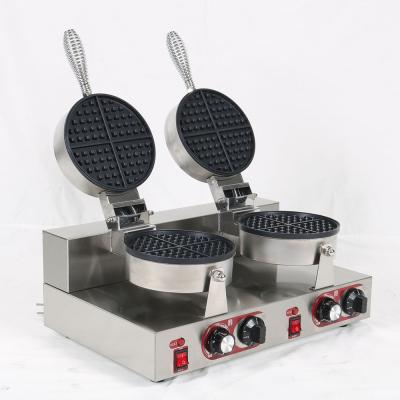China Hotel Fast Food Kitchen Equipment Nonstick Table Top Waffle Machine Electric Rotating Bubble Cake Maker for sale