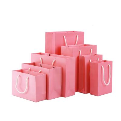 China Color Print Recyclable Garment Bags Can Be Customized Cardboard Paper Bags For Retail for sale