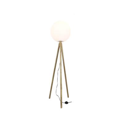 China 2021 design simple wooden tripod spherical white warm outdoor sunset bedroom floor lamp for sale
