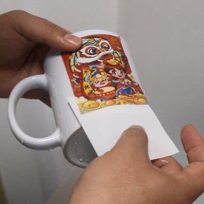 China Laser printer Factory A4 A3 A2 size laser waterslide decal paper water transfer paper for ceramic mug wood for sale