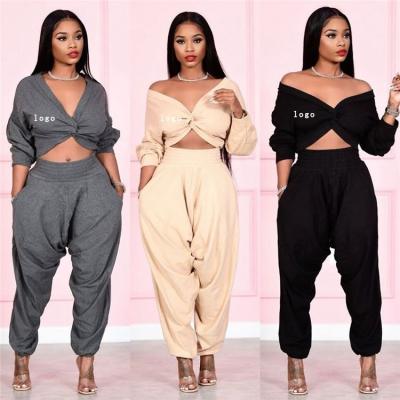 China Anti-pilling 2 Piece Set Women Tracksuits Off Shoulder Sweatshirts Suits Set Front Long Sleeve Twist Crop Top And Pant Trackers Set S390047 for sale