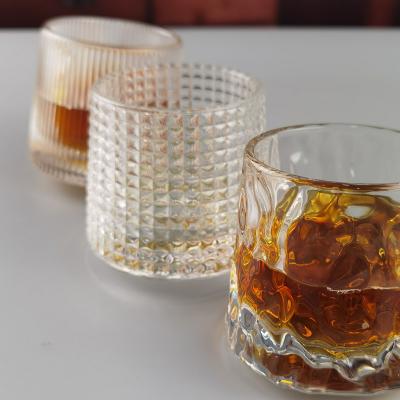 China Lead Free FDA Embossed Handmade Whiskey Glass Turning Bottom for sale