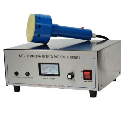 China Manual Food Induction Plastic Bottle Sealing Machine for sale