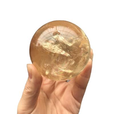 China Wholesale polished rainbow honey calcite Iceland ball crystal sphere china gift collection fengshui decoration for sale