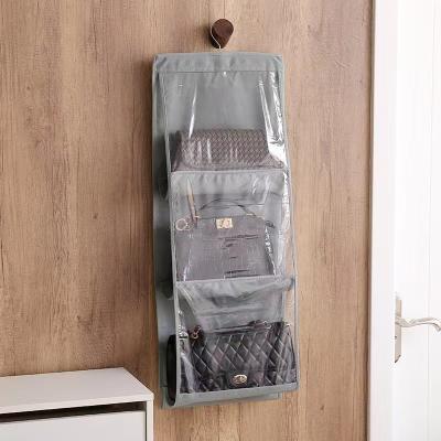 China Household Folding Storage Bag Hanging Wardrobe Hanging Leather Bag Storage Double Sided Protective Bag for sale