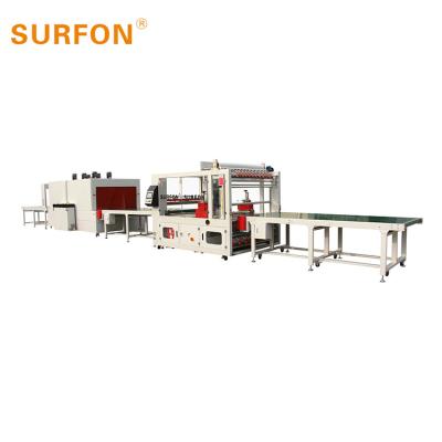 China High Speed Full Automatic Chemical Grade High Quality Candle Shrink Paper Wrapping Machine For Door for sale