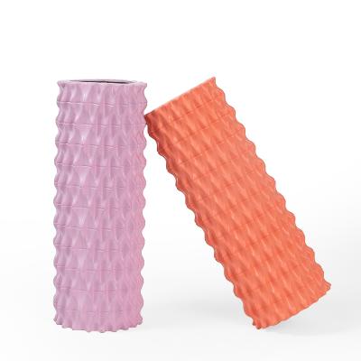 China Custom EVA+PP High Speed Deep Muscle Tissue Vibrating Cordless Rechargeable Electric Yoga Foam Roller for sale