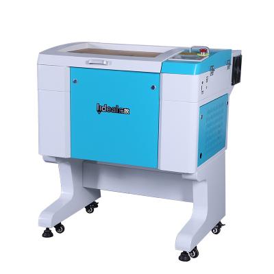 China Small Size Water Cooled CO2 6040 3050 Laser Engraving Machine Wood And Leather Price for sale