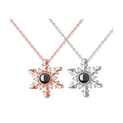 China Lead Free Shiny Silver Projection Necklace 100 Snowflake Pendant Necklace Of Languages I Love You for sale