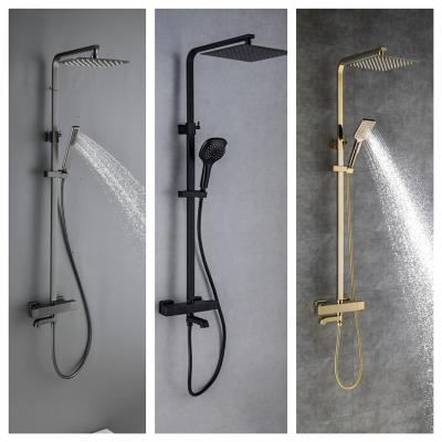 China Without Slide Bar Shower Set Luxury Square Shower With Hand Held Shower Faucet Penetrance Dragline Gold for sale