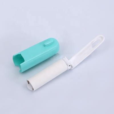 China Mini Manual Promotional Travel Silicone Fiber Roller Hair Dust Dandruff Remover Brush for sale