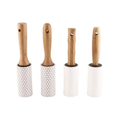 China High Quality Eco-Friendly Mini Lint Roller Travel Fiber Replaced Roller Dusting Hair Brush Leg Sticky Straight Dusting Brush for sale